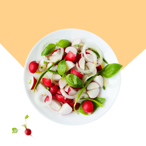 A white plate topped with salad and greens.